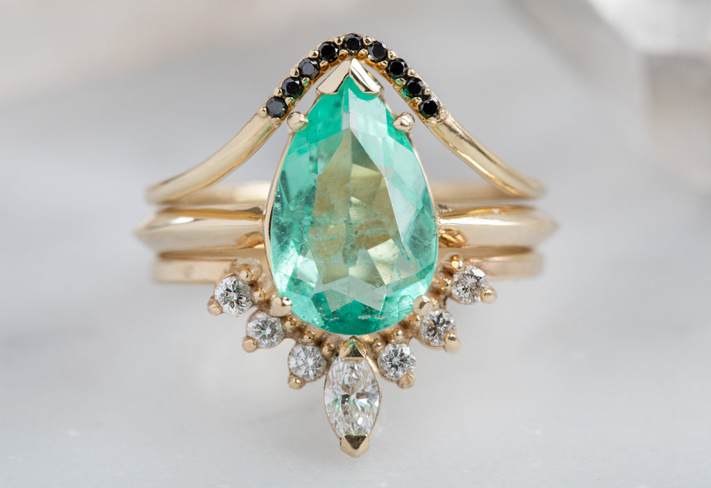 The Sage Ring with a Pear Cut Emerald