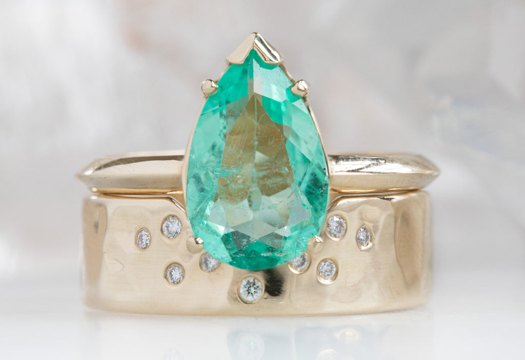 The Sage Ring with a Pear Cut Emerald