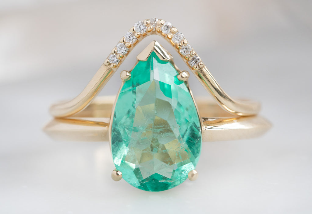 The Sage Ring with a Pear Cut Emerald