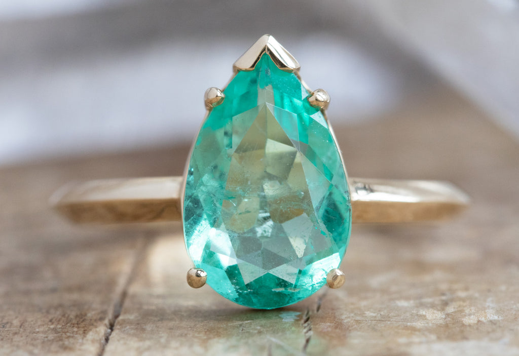 The Sage Ring with a Pear Cut Emerald