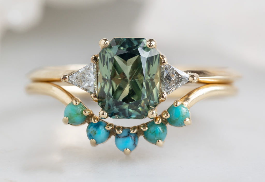 The Jade Ring with an Emerald Cut Sapphire