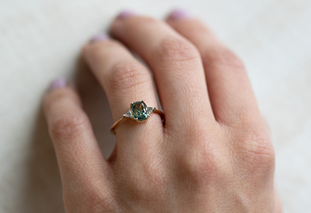 The Jade Ring with an Emerald Cut Sapphire