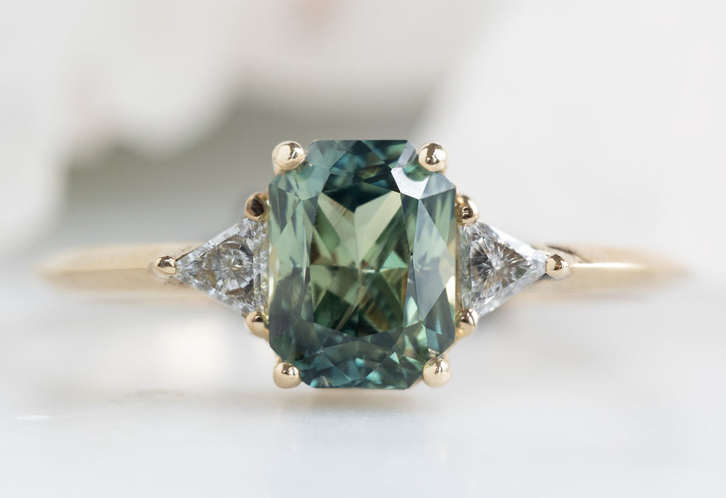 The Jade Ring with an Emerald Cut Sapphire