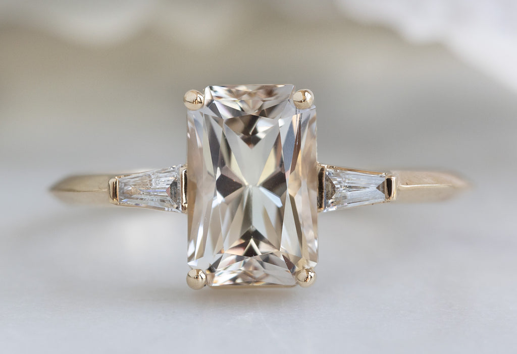 The Ash Ring with an Emerald Cut Tanzanite