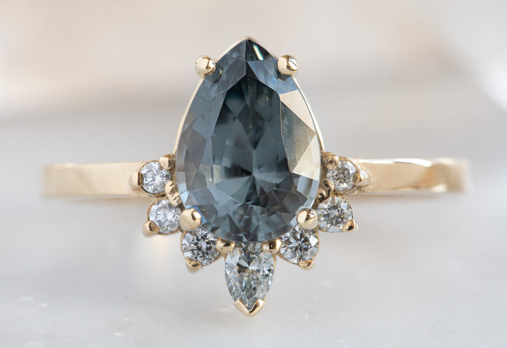 The Aster Ring with a Pear Cut Grey Spinel