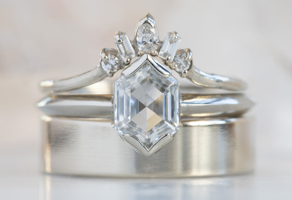 The Sage Ring with a Hexagon-Cut White Diamond