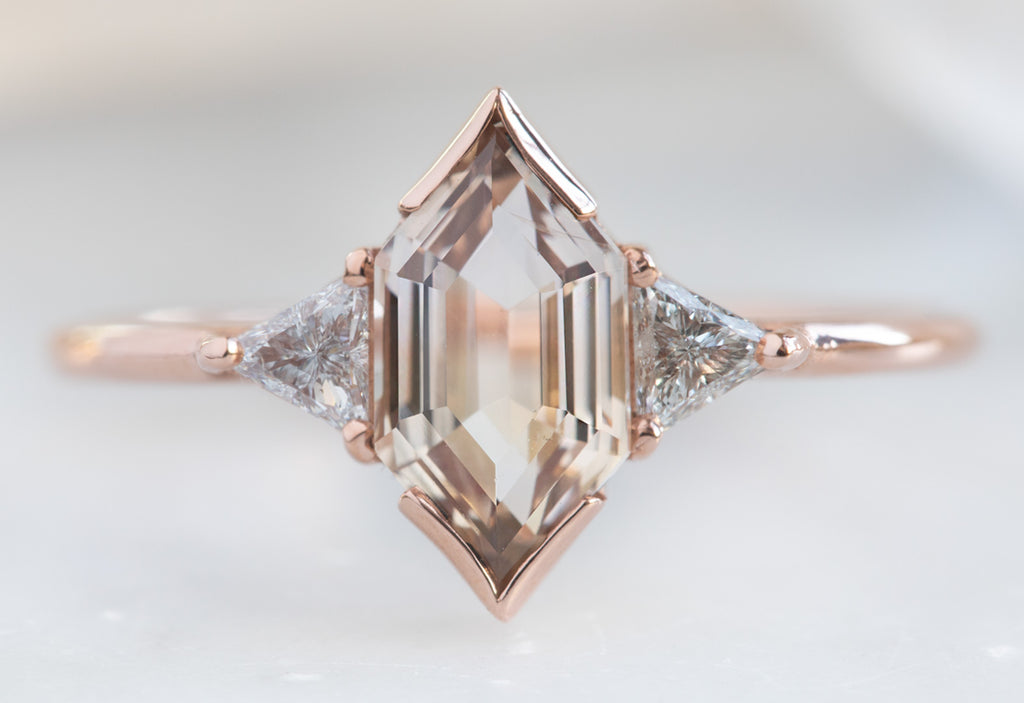 The Jade Ring with a Hexagon Cut Peach Sapphire 