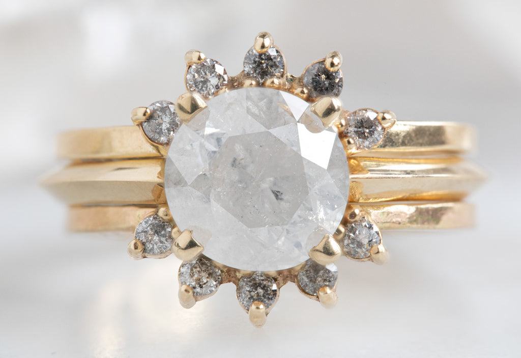 The Iris Ring with an Opalescent Round Diamond