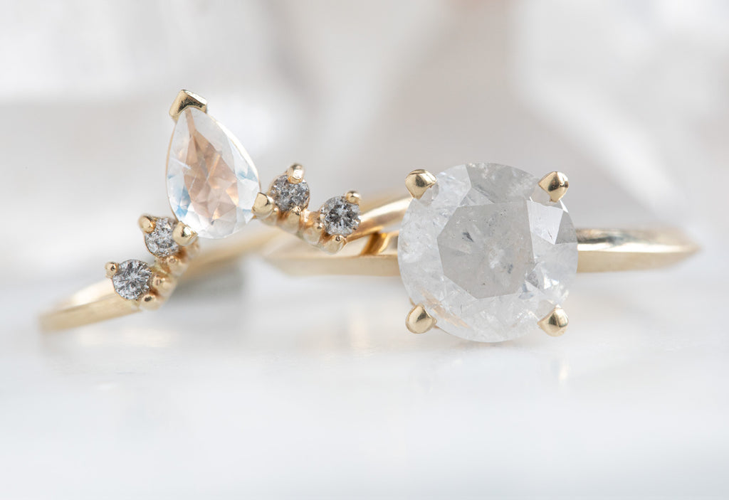 The Iris Ring with an Opalescent Round Diamond