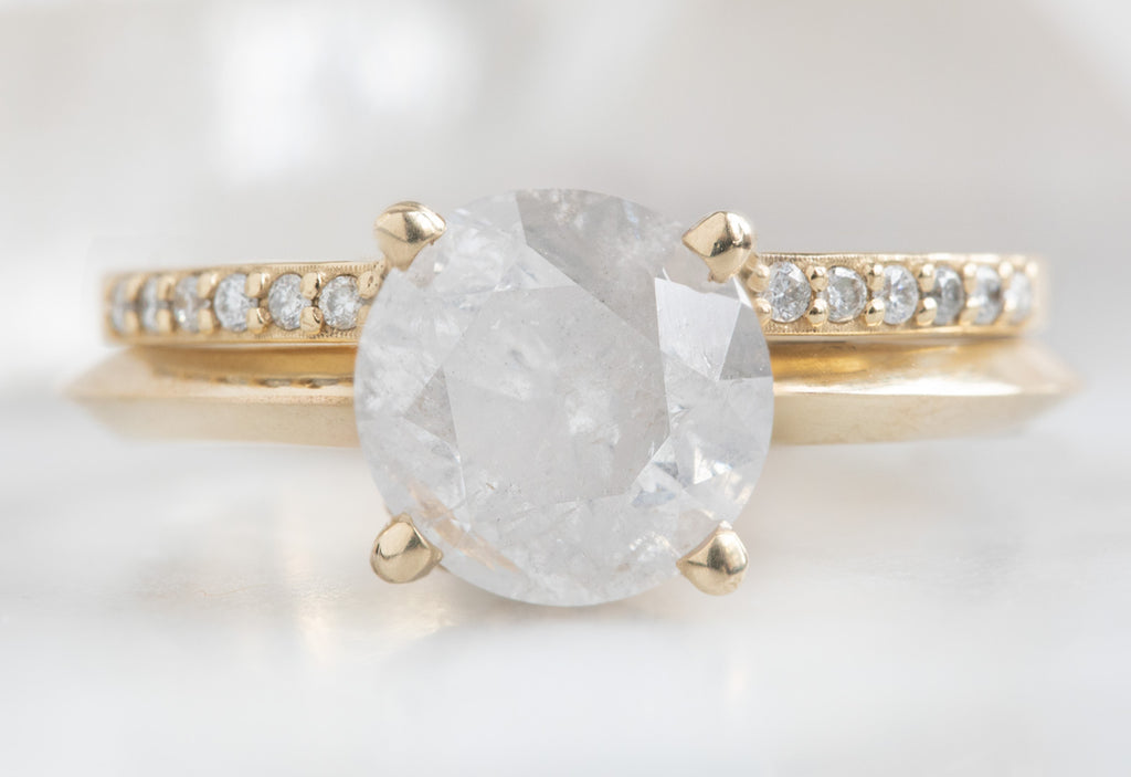 The Iris Ring with an Opalescent Round Diamond