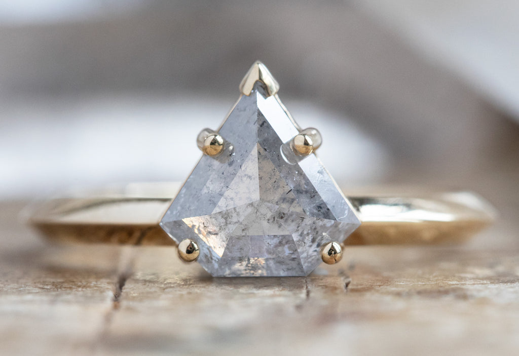 The Sage Ring with an Icy White Shield Cut Diamond