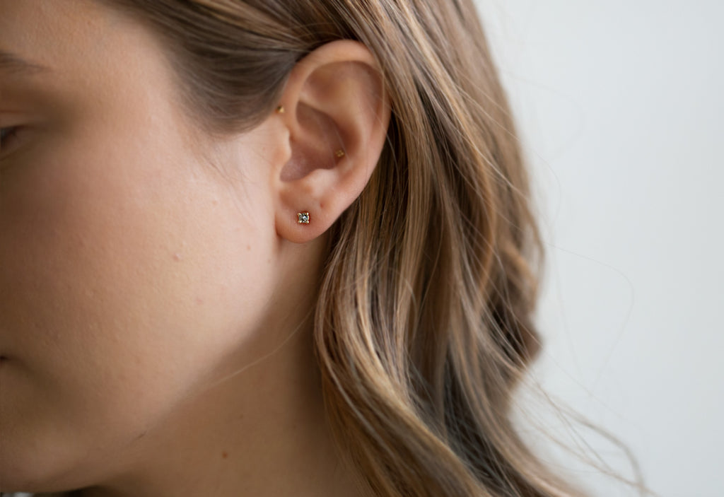 Inverted Salt & Pepper Diamond Stud Earrings on model