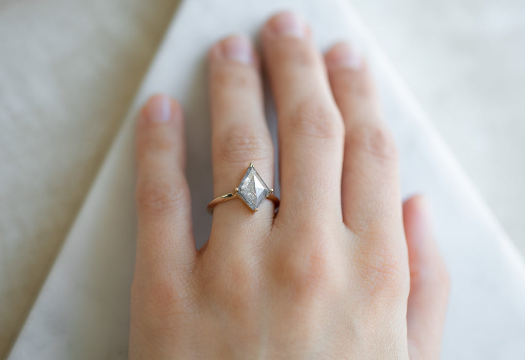 The Sage Ring with a Silver-Grey Kite Diamond On Model