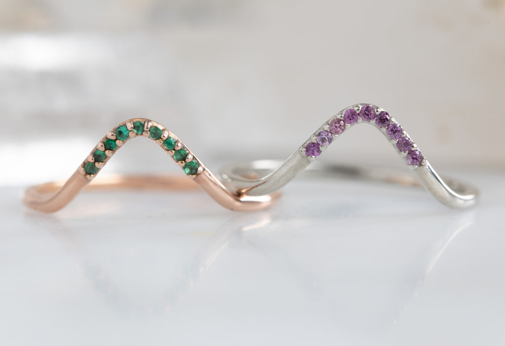 rose gold emerald pavé peak stacking band and white gold ruby pavé peak stacking band