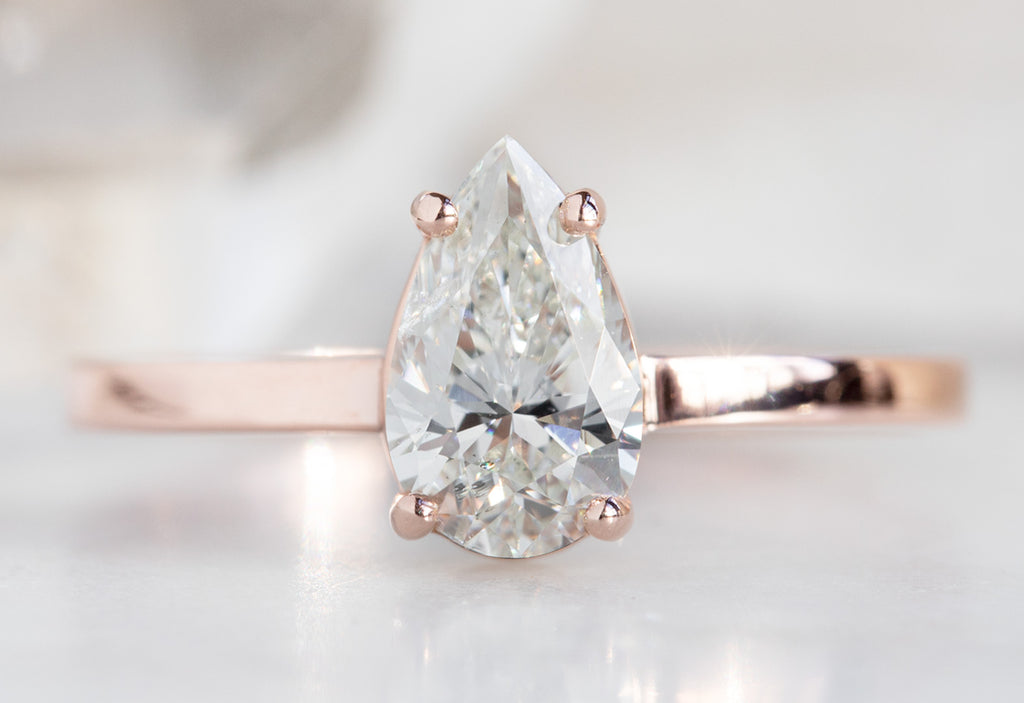The Bryn Ring with a White Pear-Cut Diamond
