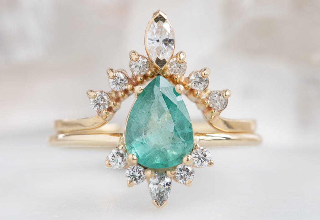 Pear-Cut Emerald Engagement Ring with Attached Sunburst