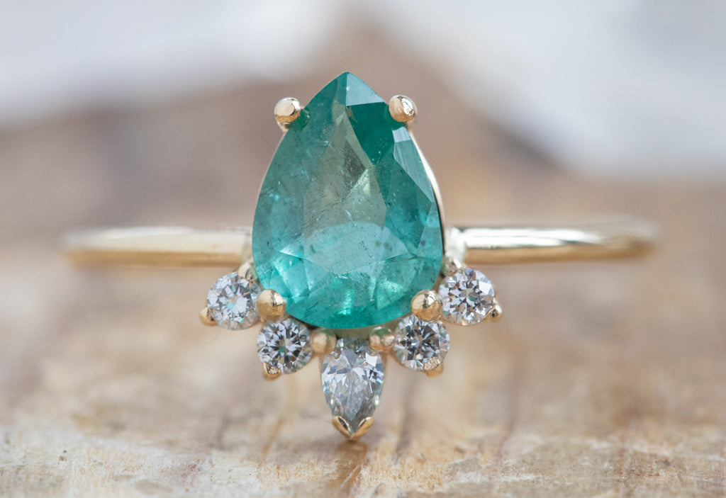 Pear-Cut Emerald Engagement Ring with Attached Sunburst