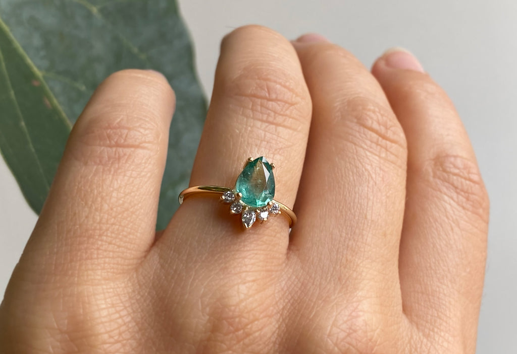 Pear-Cut Emerald Engagement Ring with Attached Sunburst