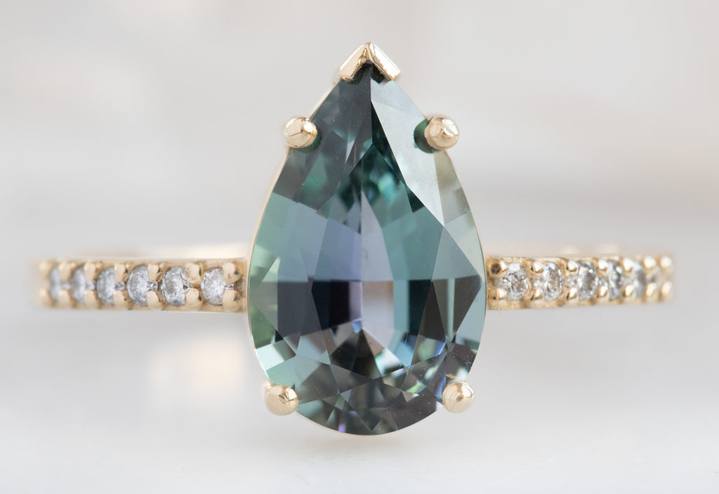 Pear Cut Tanzanite Engagement Ring with Pavé Band