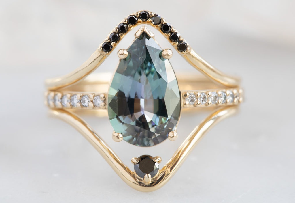 Pear Cut Tanzanite Engagement Ring with Pavé Band