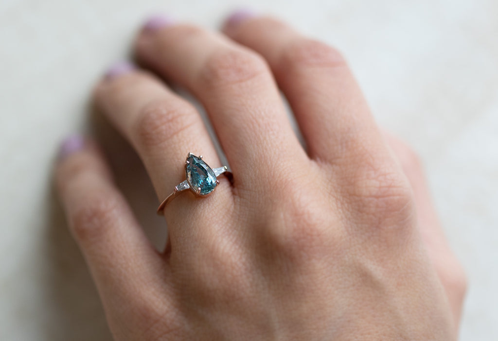 The Ash Ring with a Pear Cut Sapphire