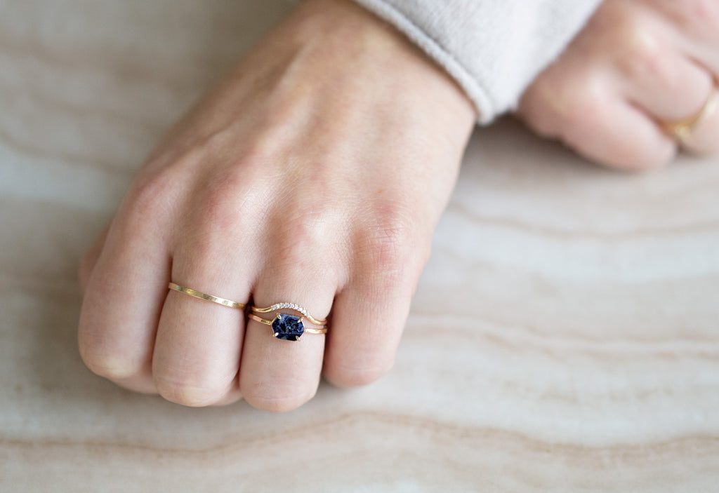 Raw Montana Sapphire Hexagon Ring with stacking band on hand-10k Yellow Gold