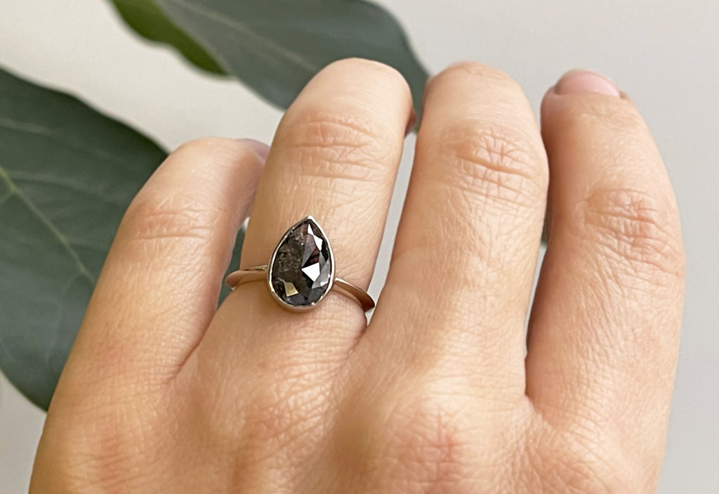 The Hazel Ring with a Black Pear-Shaped Diamond