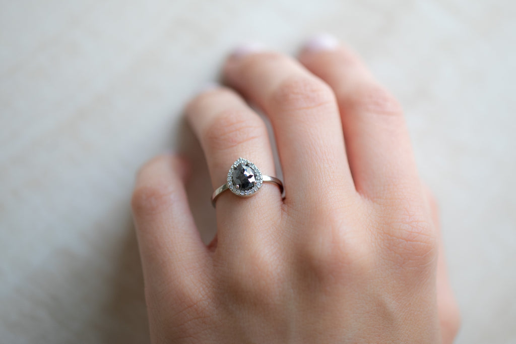 The Dahlia Ring with a Pear Cut Black Diamond