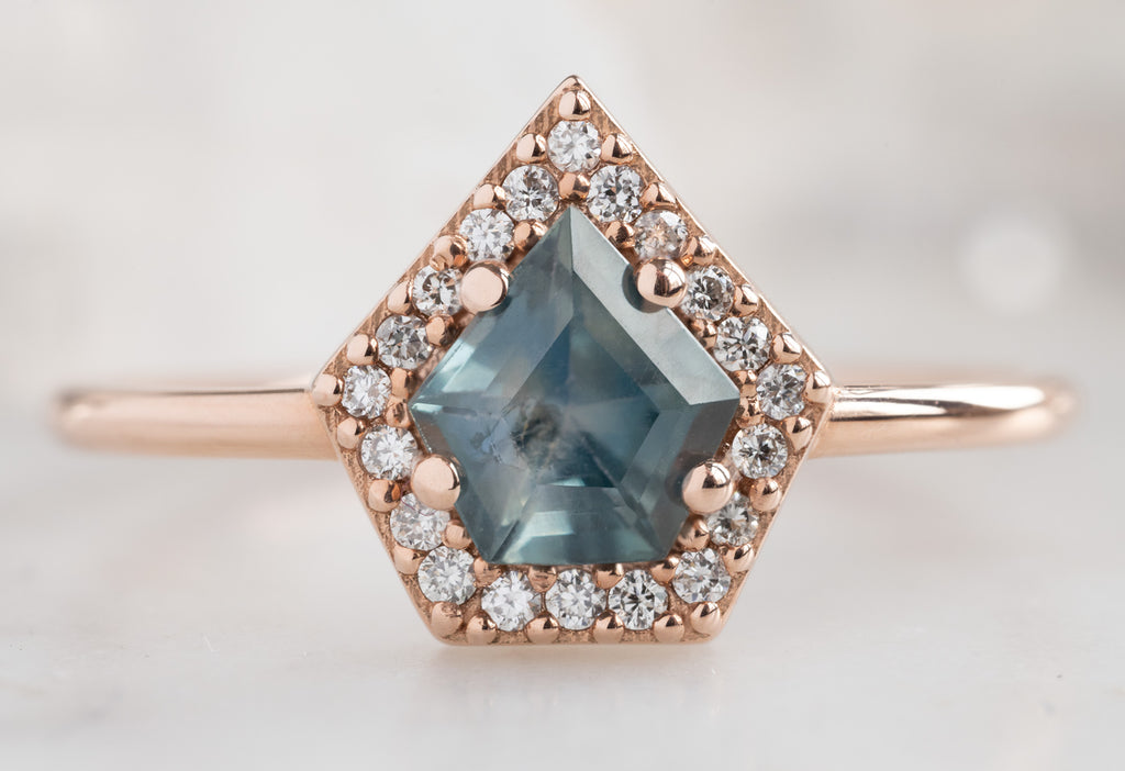 The Dahlia Ring with a Shield-Cut Montana Sapphire