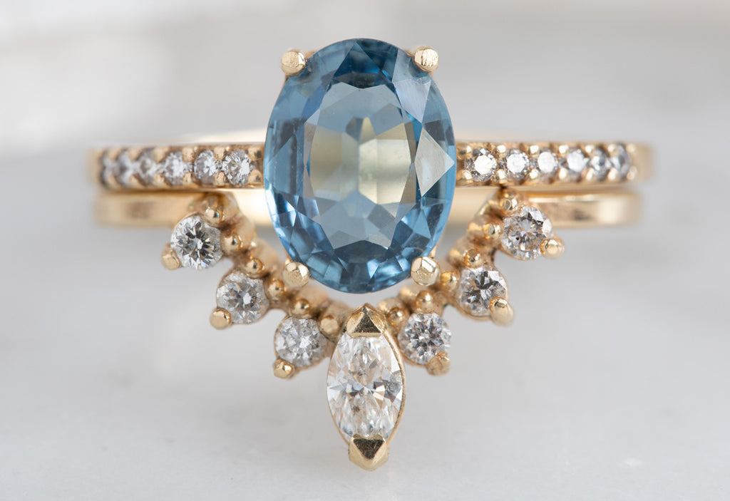 The Willow Ring with an Oval-Cut Sapphire with White Diamond Sunburst Stacking Band