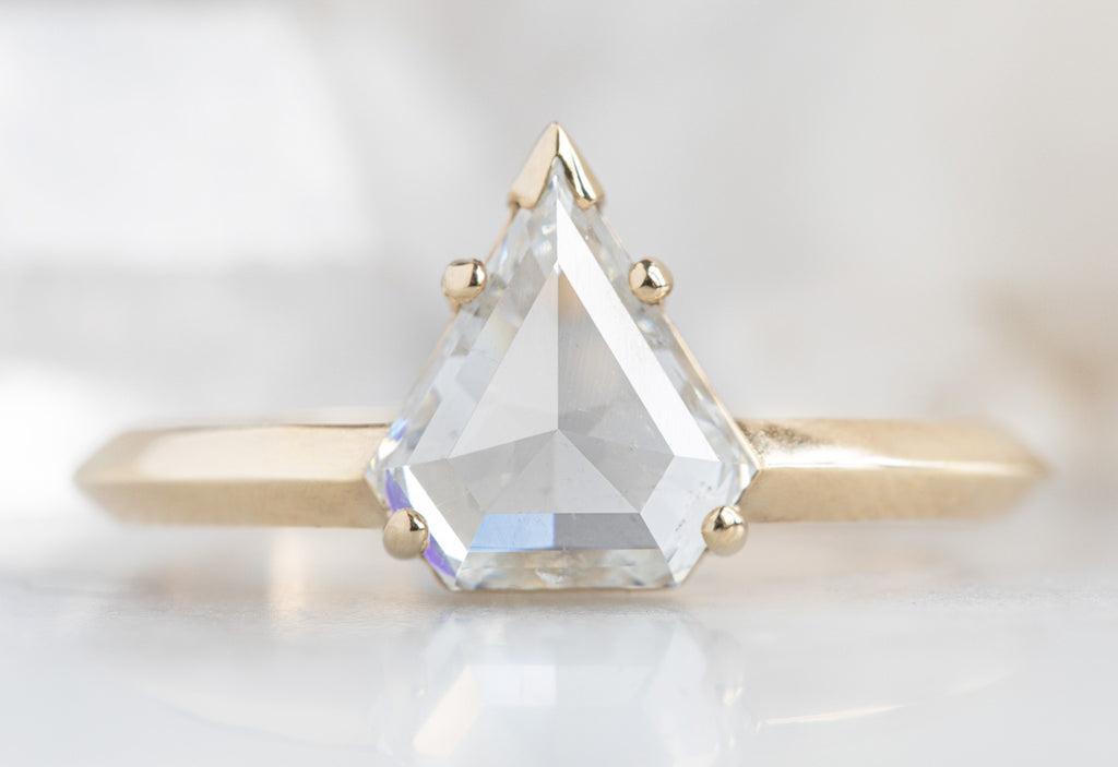 The Sage Ring with a White Shield Cut Diamond