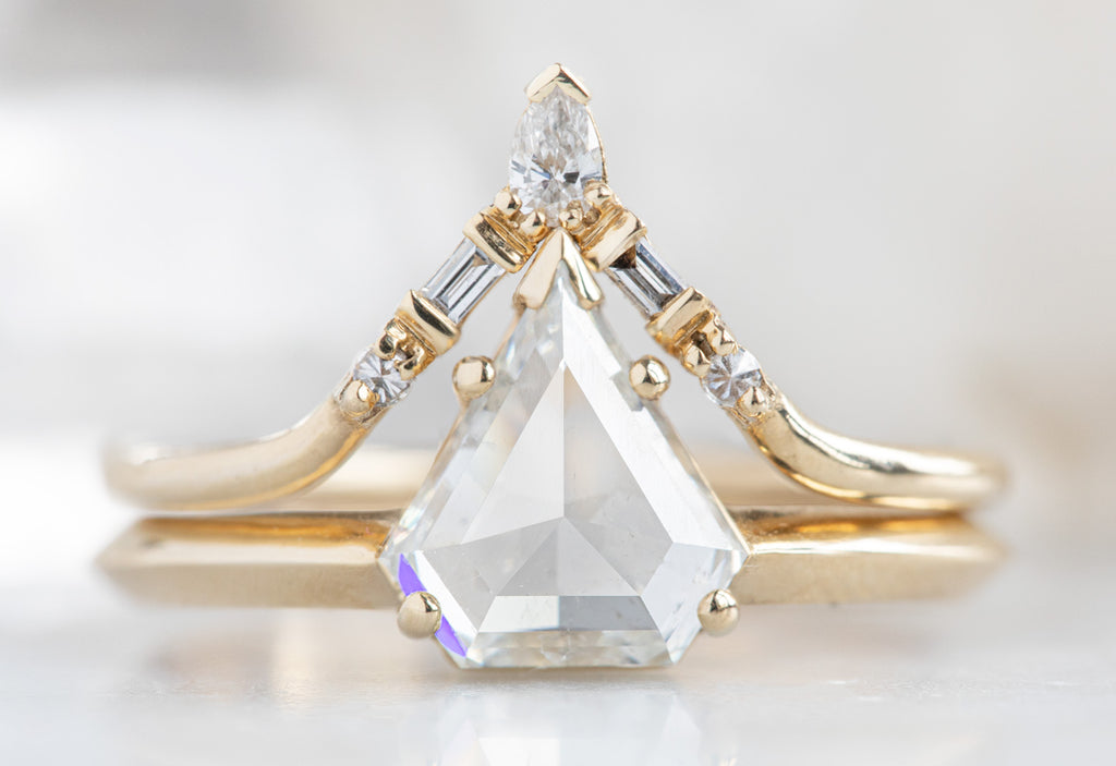 The Sage Ring with a White Shield Cut Diamond