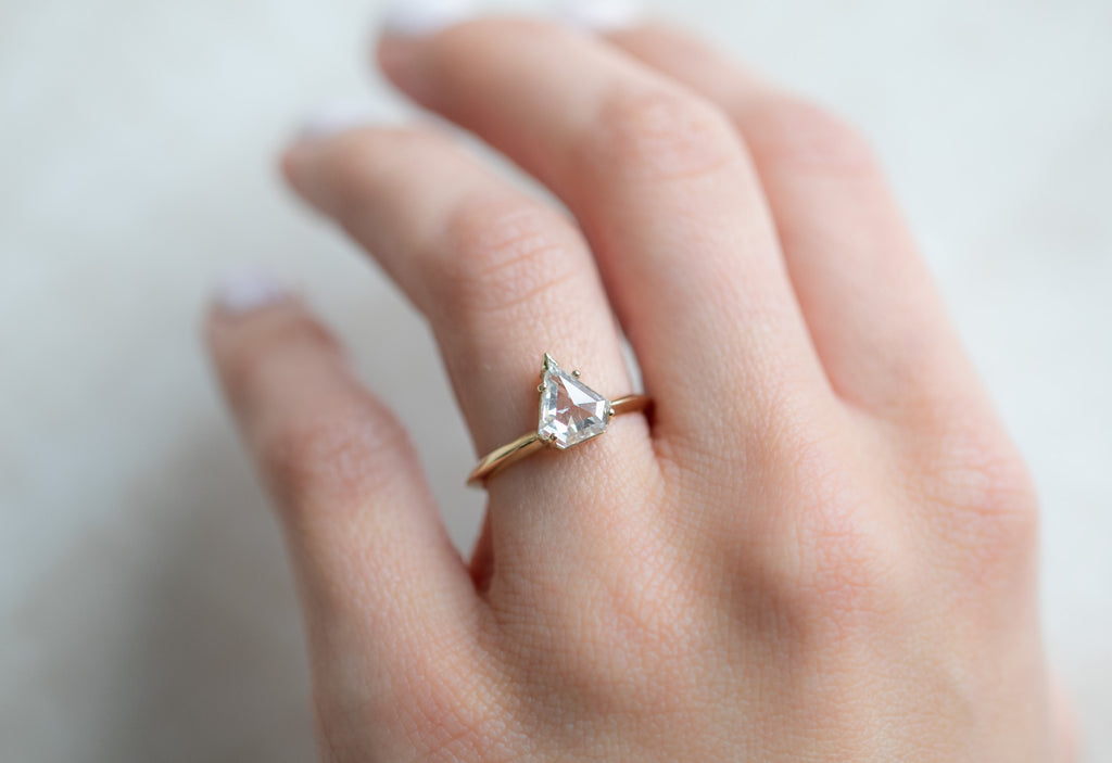 The Sage Ring with a White Shield Cut Diamond