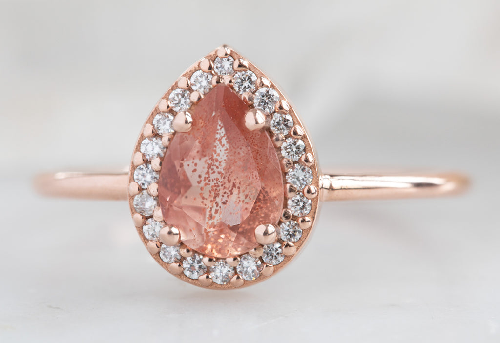 The Dahlia Ring with a Pear-Cut Sunstone